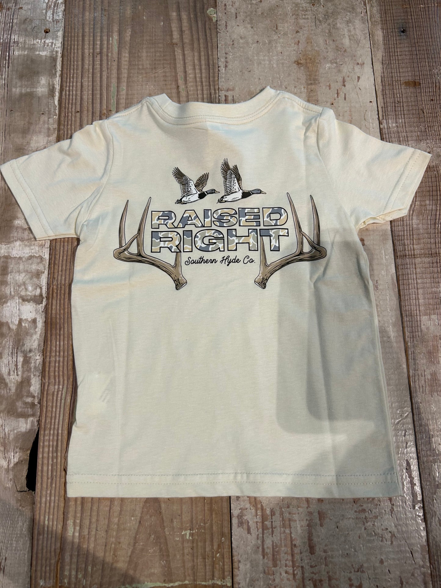 Raised Right Tee